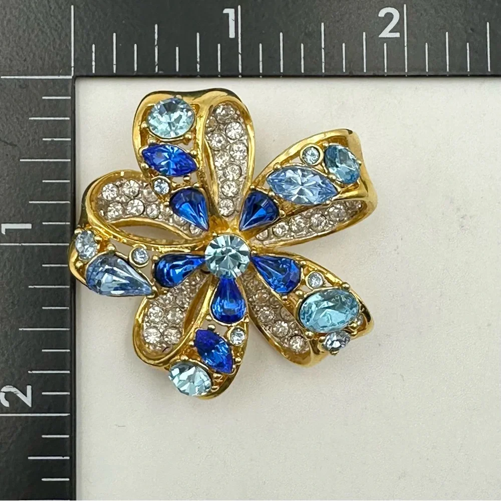 Nolan Miller Blue Tones & Clear Rhinestone Flower Bow Gold Tone Brooch